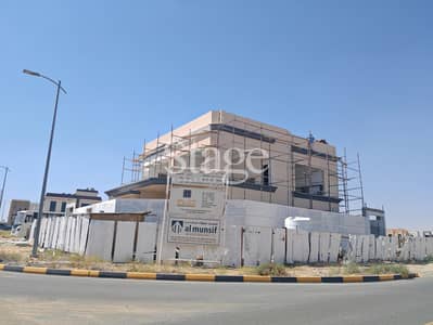 5 Bedroom Villa for Sale in Tilal City, Sharjah - Corner Large G+1 Villa | Close to completion