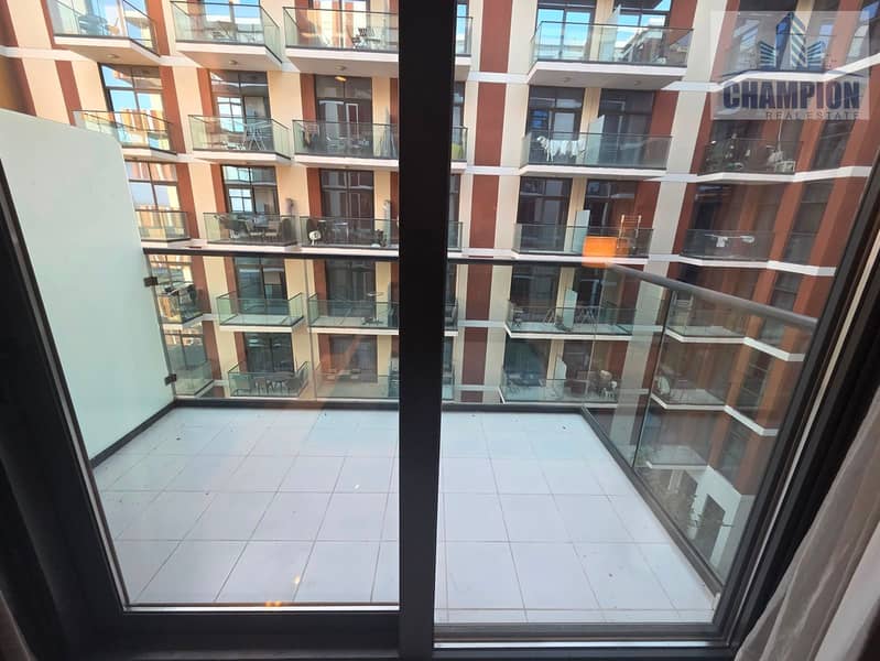 Furnished Studio | Celestia A | Balcony & Courtyard View