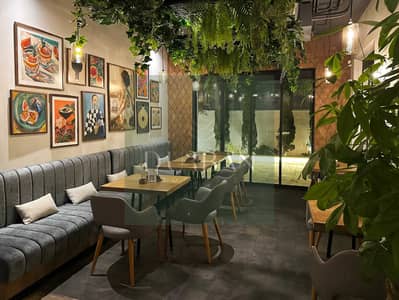 Shop for Rent in Al Karama, Dubai - non-smoking-indoor-areas. jpg Shop for Rent in Al Karama, Dubai - non-smoking-indoor-areas. jpg