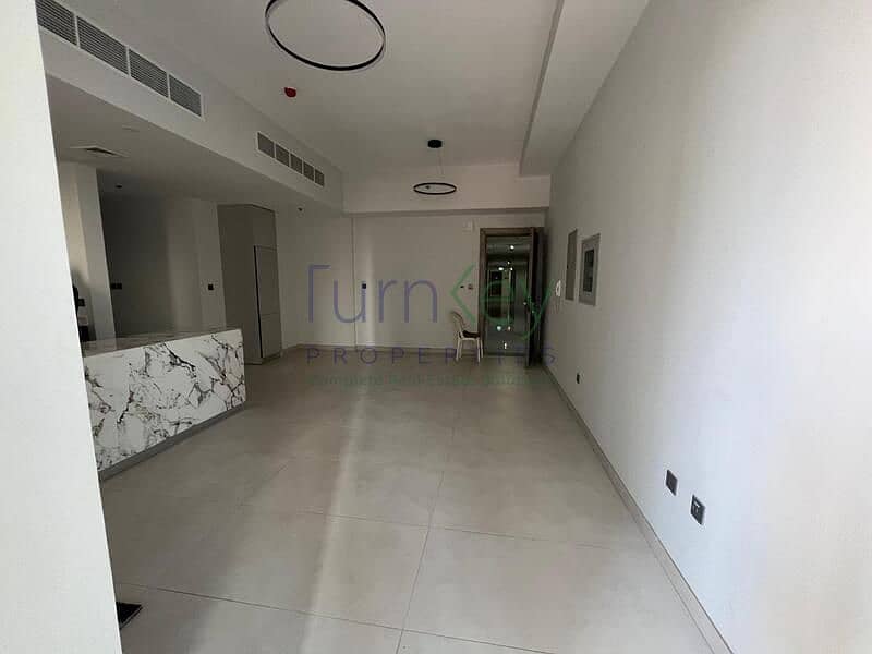 Spacious 2BR Apartment | Amal Tower | Multiple Views | Unfurnished - Image 2