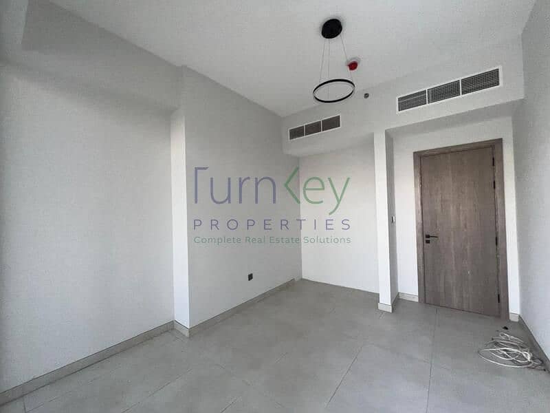 Spacious 2BR Apartment | Amal Tower | Multiple Views | Unfurnished - Image 3