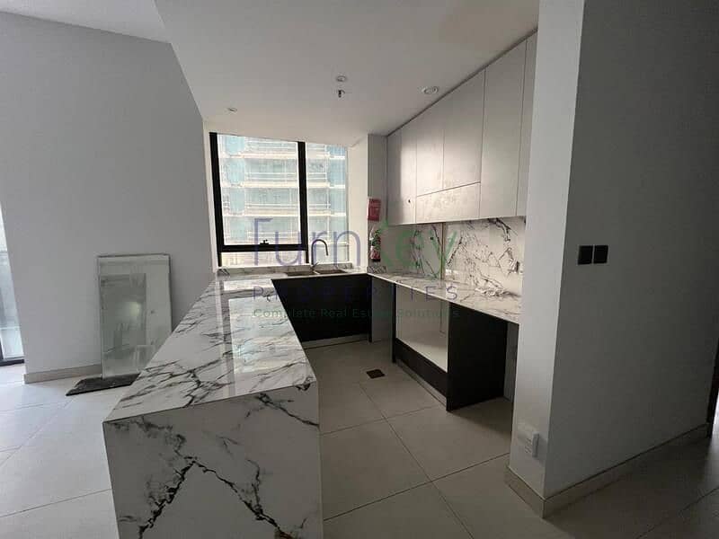 Spacious 2BR Apartment | Amal Tower | Multiple Views | Unfurnished - Image 9
