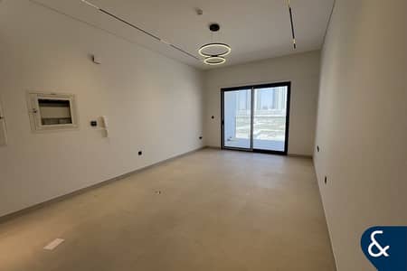 1 Bedroom Apartment for Sale in Dubai Studio City, Dubai - Closed Kitchen | Pool View | Large Layout 1 Bedroom Apartment for Sale in Dubai Studio City, Dubai - Closed Kitchen | Pool View | Large Layout