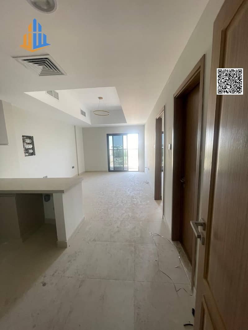 Two-bedroom apartment for sale in Kintia Residence, Ajman | Ready to move in and rent immediately - Image 1