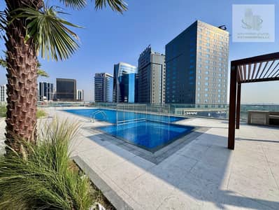 2 Bedroom Apartment for Rent in Business Bay, Dubai - POOL 1. jpg 2 Bedroom Apartment for Rent in Business Bay, Dubai - POOL 1. jpg