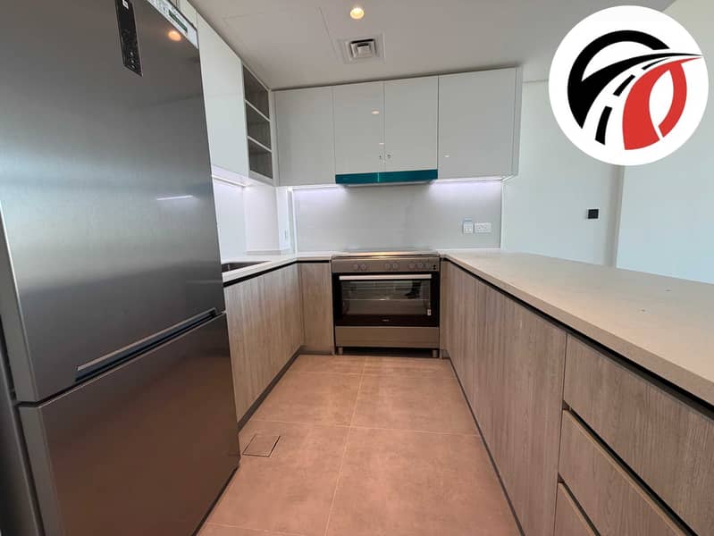 Spacious 2 BHK Apartment with Open Views & Balcony - Image 4