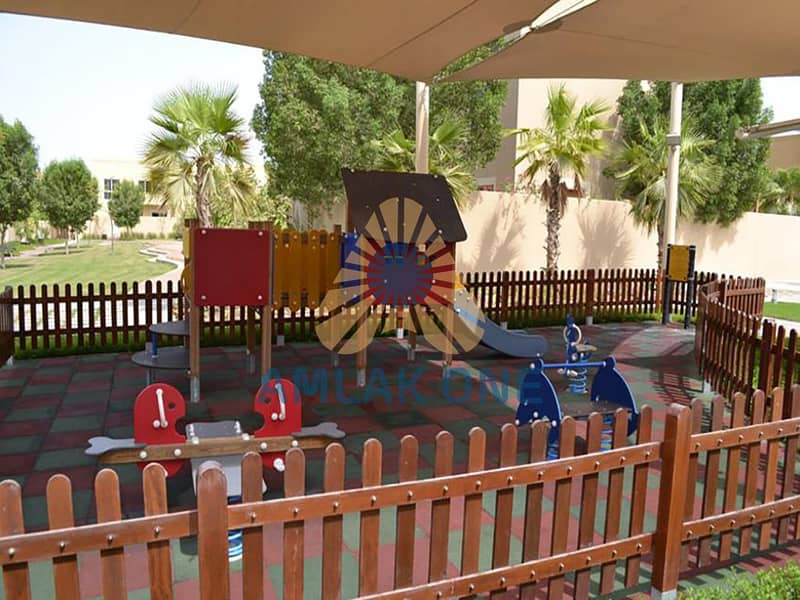 14 Actual-GWwLaIsGfpjtLjpWaerut011childrens_play_areas_with_soft_flooring_and_shading_are_located_throughout_al_raha_gardens_1. jpg