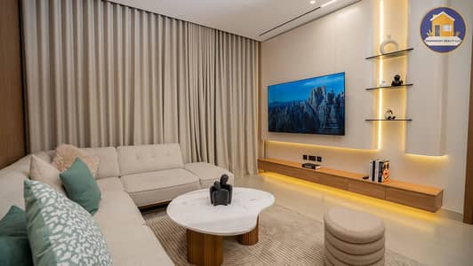 2 Bedroom Flat for Sale in Majan, Dubai - living area in a 2 bedroom apartment for sale in Tulip Oasis 11 Majan. jpg