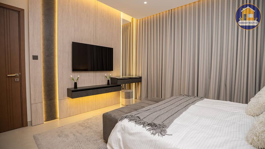 6 spacious 2 bedroom apartment for sale in Tulip Oasis 11 Majan. jpg