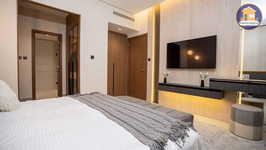 7 modern 2 bedroom apartment for sale in Tulip Oasis 11 Majan. jpg