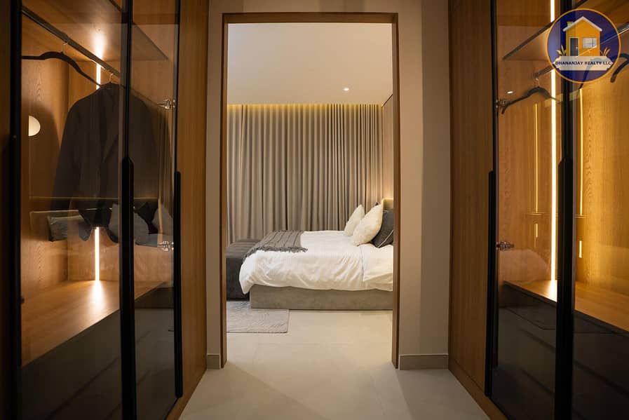 9 built-n closet in a 2 bedroom apartment for sale in Tulip Oasis 11 Majan. jpg
