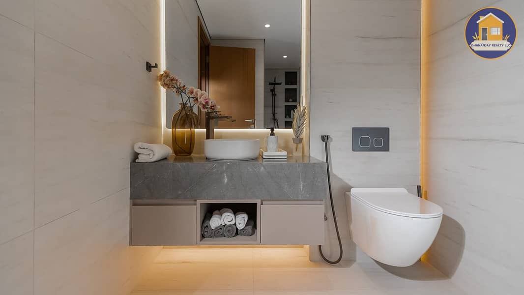 18 washroom in a 2 bedroom apartment for sale in Tulip Oasis 11 Majan. jpg