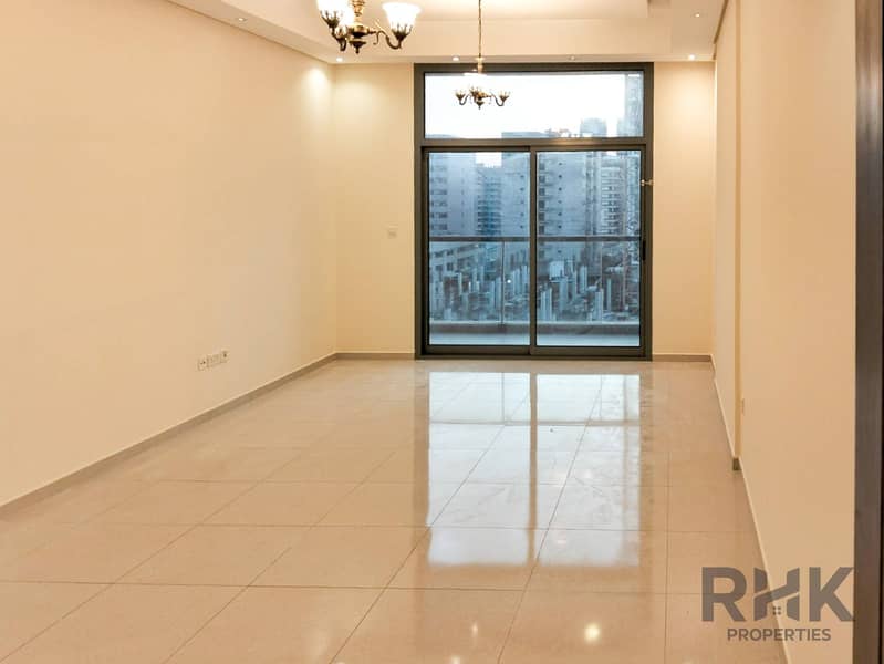 4 Bright open-plan living area with marble flooring in Altia Residence apartment, Dubai Silicon Oasis