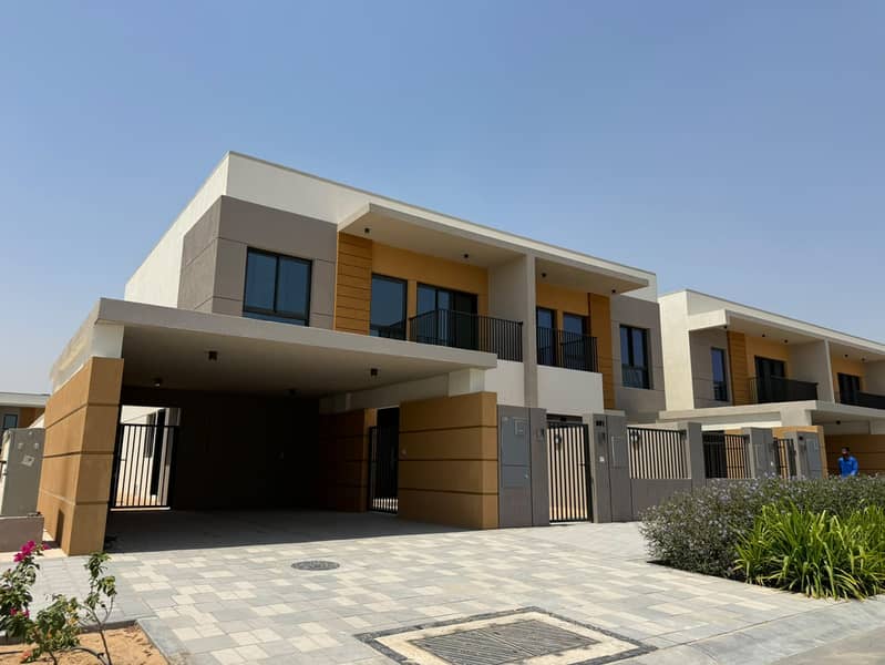 A modern corner villa located within the upscale Azha compound in the Al Amrah area of Ajman, offering a comfortable and family-friendly lifestyle w - Image 1
