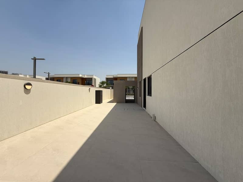 A modern corner villa located within the upscale Azha compound in the Al Amrah area of Ajman, offering a comfortable and family-friendly lifestyle w - Image 10