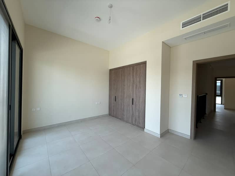 A modern corner villa located within the upscale Azha compound in the Al Amrah area of Ajman, offering a comfortable and family-friendly lifestyle w - Image 14