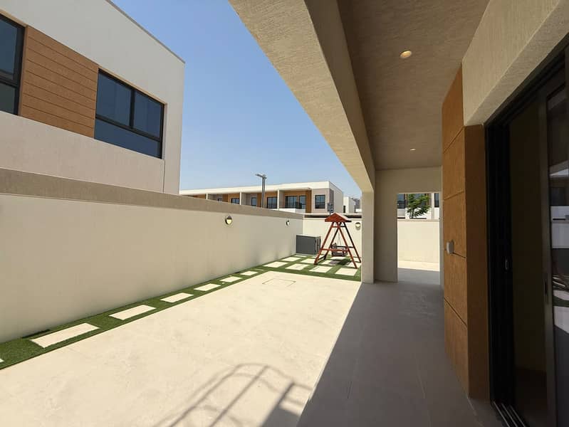 A modern corner villa located within the upscale Azha compound in the Al Amrah area of Ajman, offering a comfortable and family-friendly lifestyle w - Image 18