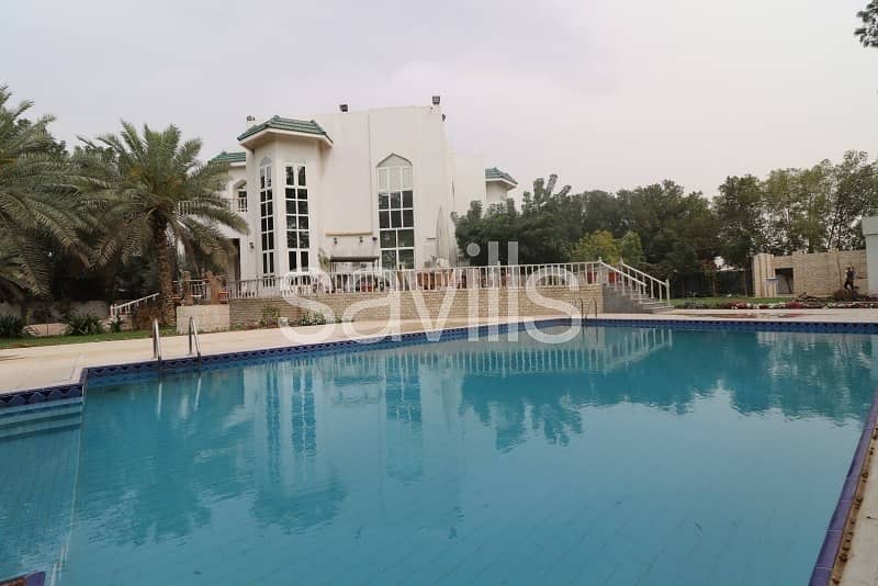 Al Tala'a spacious villa with garden and private pool Al Tala'a spacious villa with garden and private pool
