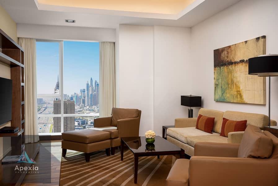 17 Deluxe Two Bedroom Apartment_Living Room. jpg