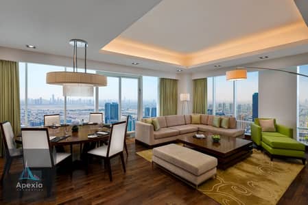 3 Schlafzimmer Hotel Apartment zum zur Miete in Al Sufouh, Dubai - Deluxe Three Bedroom Penthouse_Dining & Living Room. jpg