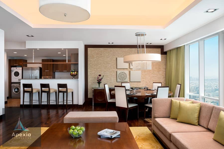 2 Deluxe Three Bedroom Penthouse_Dining & Living Room_1. jpg