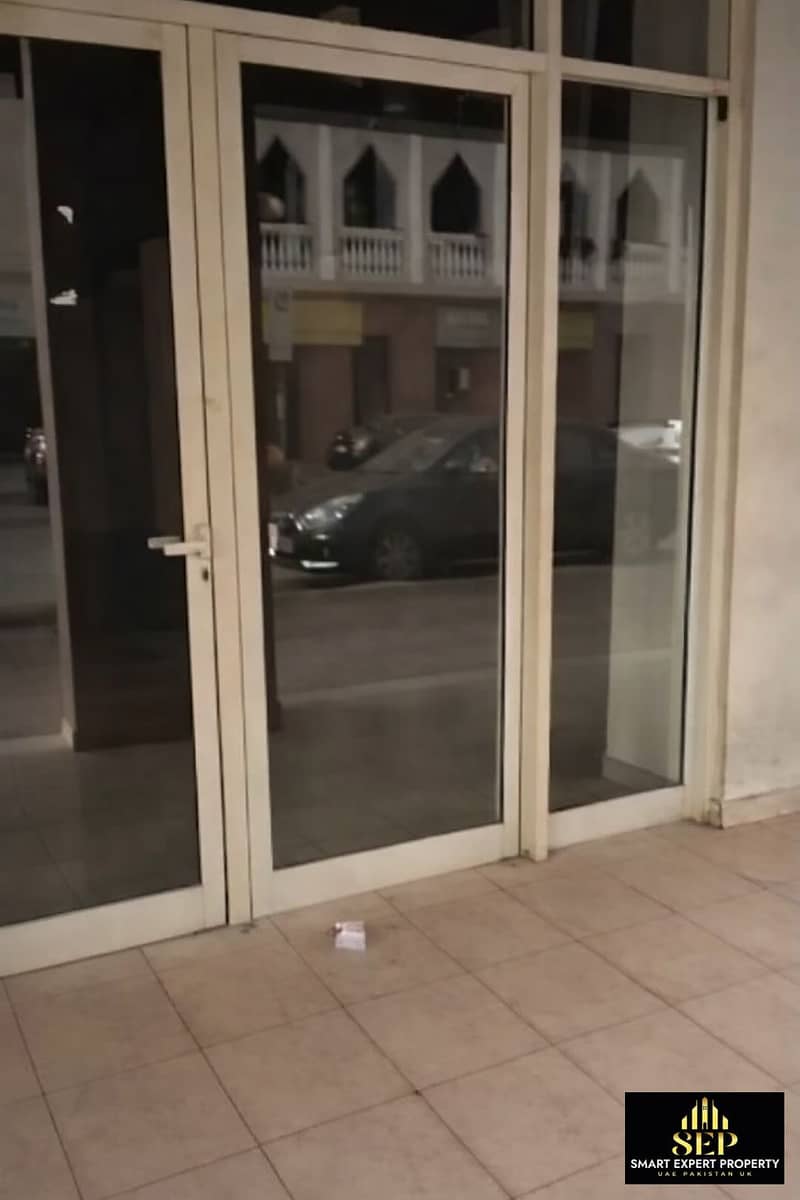2 Nighttime entrance with reflective doors. png