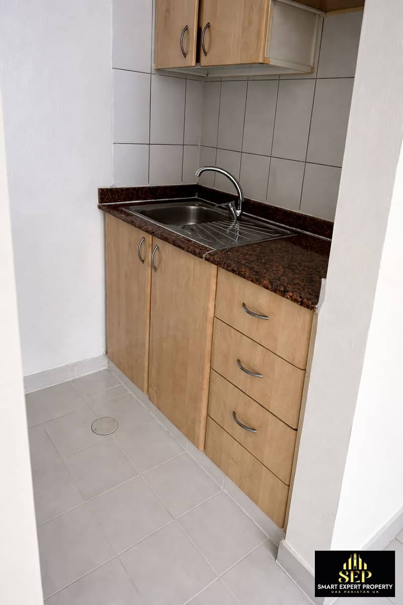 4 Modern kitchenette with sleek design. png