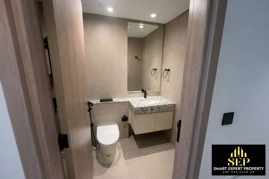 5 Modern bathroom with wooden door details. png