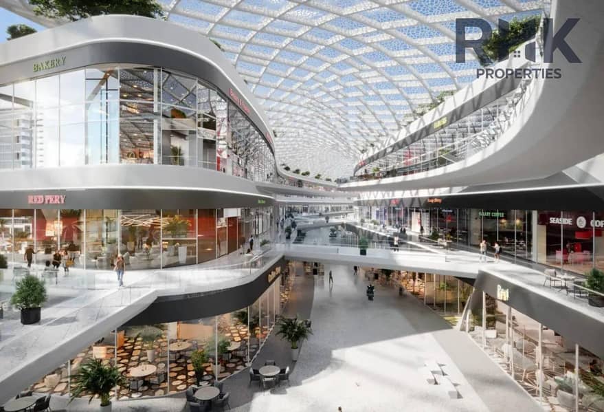 10 Azizi Venice retail mall interior with glass domed roof and multi-level shops