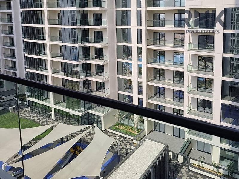 13 Balcony view over Crest Grande podium deck and kids play area, Sobha Hartland