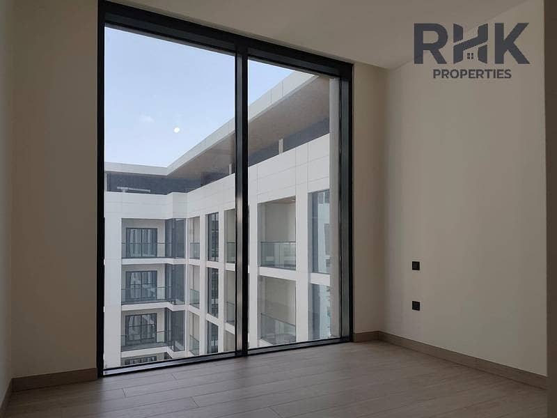4 Crest Grande bedroom with floor-to-ceiling windows and podium view, Sobha Hartland