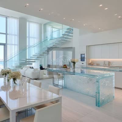 1 Bedroom Flat for Sale in Nad Al Sili, Ras Al Khaimah - Major_Development_Wide-angle_duplex_kitchen_showing_full_spat_e080639d-7c7e-4814-aedd-a2260b79a87c_1. png