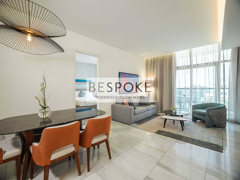 3 1.9 TH8_1BR_Suite_ArabianSeaView_LivingRoom. jpg