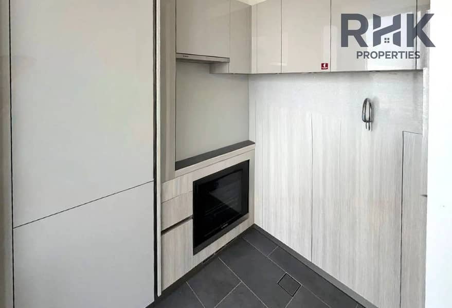 11 Modern bathroom with walk-in rain shower and mosaic tiling, Sobha Hartland Dubai