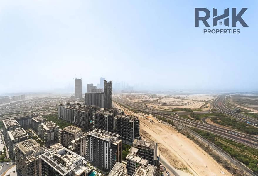 16 Panoramic Dubai skyline and Downtown views from Sobha Hartland high-floor apartment