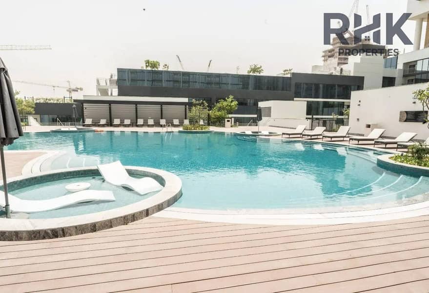17 Resort-style swimming pool and sun deck at Sobha Hartland, Dubai