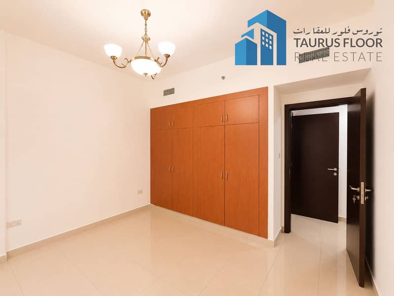 Chiller Free 2BR | Walk to Sharaf DG Metro | Balcony Gym Parking