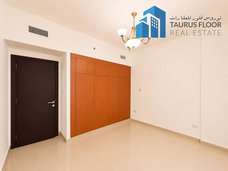Chiller Free 2BR | Walk to Sharaf DG Metro | Balcony Gym Parking