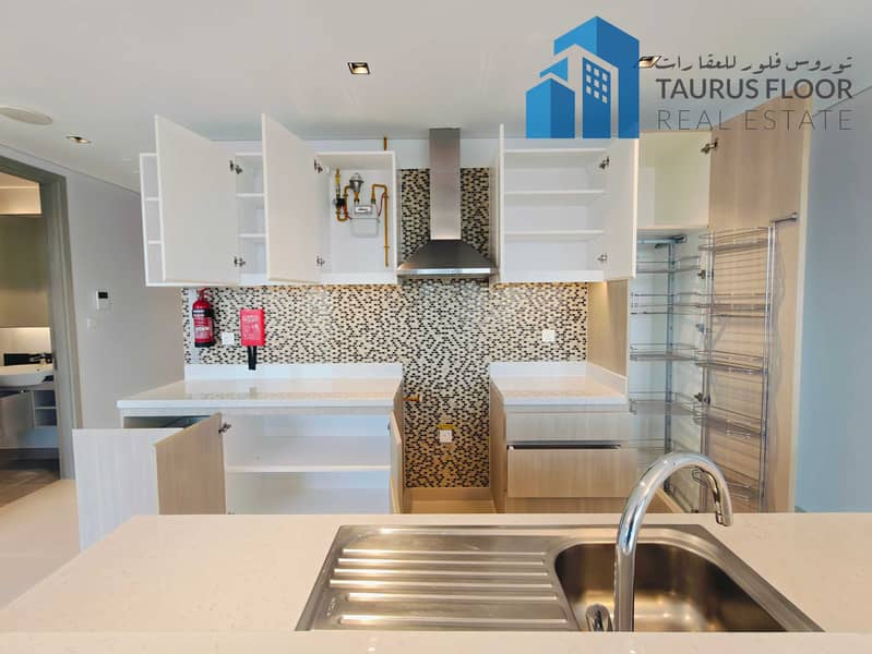 Modern 1BHK with Balcony | 2 Washrooms & Covered Parking | 2 Min to Gold Souq Metro
