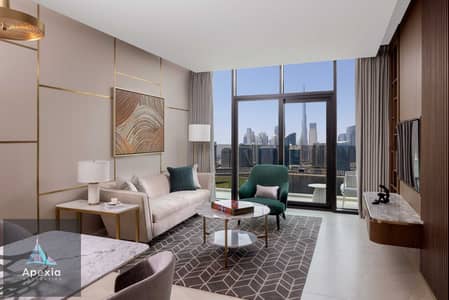 1 Bedroom Hotel Apartment for Rent in Business Bay, Dubai - One Bed Canal View Living Room. jpg