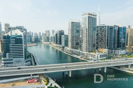 شقة 2 غرفة نوم للايجار في الخليج التجاري، دبي - شقة في كانال باي،الخليج التجاري 2 غرف 145000 درهم - 15591440