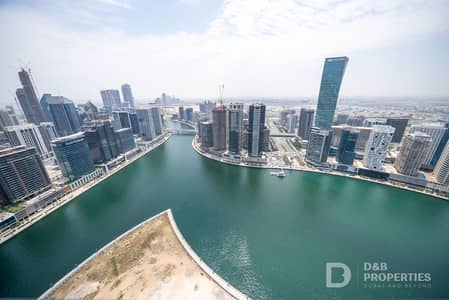 فلیٹ 2 غرفة نوم للايجار في الخليج التجاري، دبي - شقة في بنينسولا ثري،بينينسولا،الخليج التجاري 2 غرف 220000 درهم - 15591811