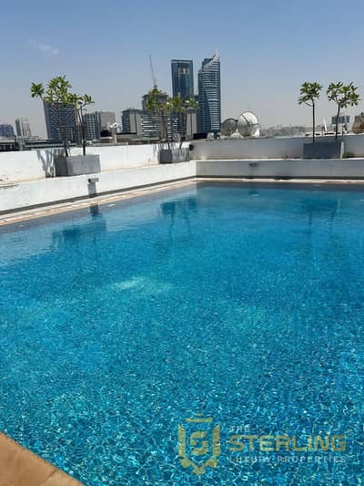 Studio for Rent in Jumeirah Village Circle (JVC), Dubai - swimming pool. jpg