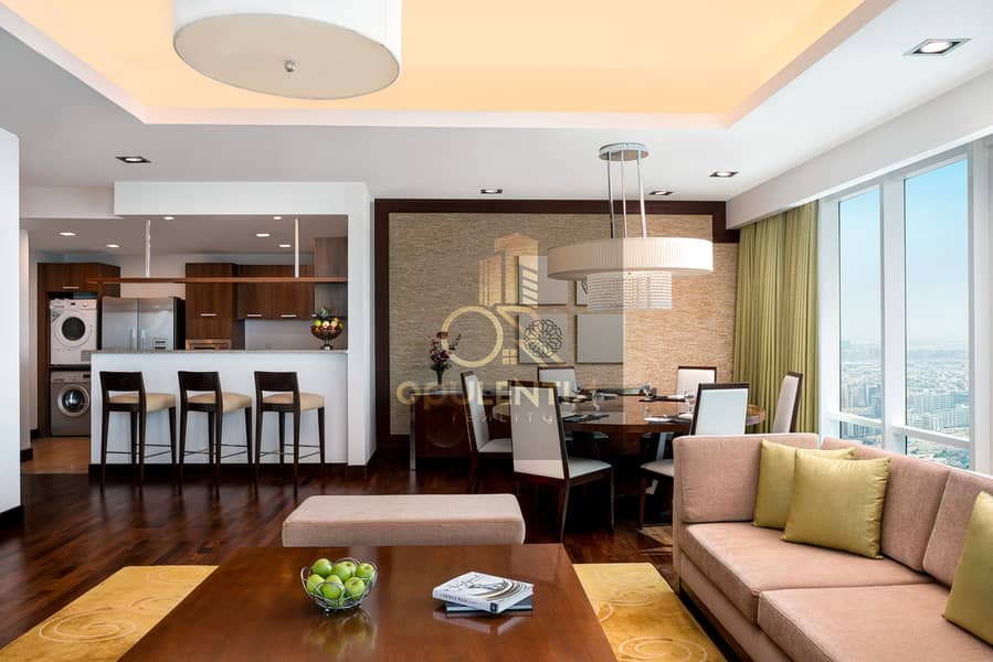 2 Deluxe Three Bedroom Penthouse_Dining & Living Room_1. jpg