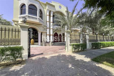 8 Bedroom Villa for Rent in Emirates Hills, Dubai - Emirates Hills | Stunning Lake Views | Vacant