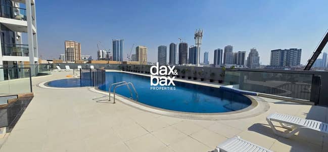 1 Bedroom Flat for Sale in Jumeirah Village Circle (JVC), Dubai - Pool  Area _ Central Park Tower _ Dubai. jpg