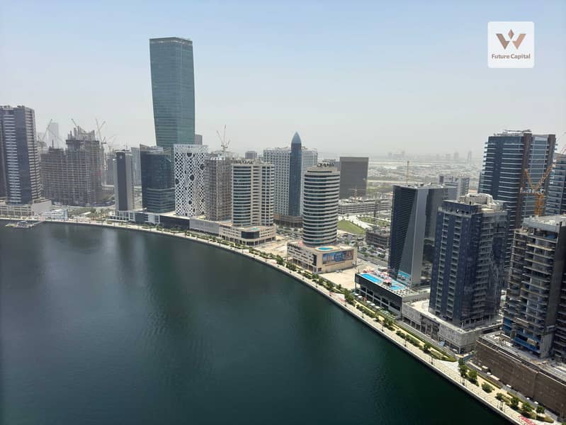 High-Floor 3BR | Jumeirah Living Business Bay | Canal & Skyline Views | Wooden Flooring