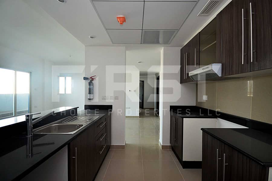 10 Internal Photo of 3 Bedroom Apartment Type D Open Kitchen in Al Reef Downtown Al Reef Abu Dhabi UAE 145sq. m 1560 sq. ft (7). jpg