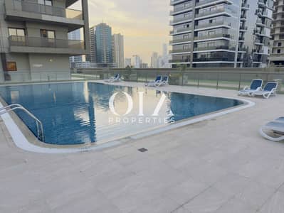1 Schlafzimmer Wohnung zum zum Verkauf in Dubai Sports City, Dubai - Pool2. jpg
