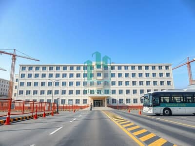 Labour Camp para en Venta en Al Hayl, Fujairah - Outside_daytime_photo_of_a_large_labor_camp_building_complex_similar_composition_to_the_reference_a_modern_multi_story_rectangular_dormitory_block_with_pale_cream_exterior_panels_and_repeated_rows_of_identical_window. jpeg Labour Camp para en Venta en Al Hayl, Fujairah - Outside_daytime_photo_of_a_large_labor_camp_building_complex_similar_composition_to_the_reference_a_modern_multi_story_rectangular_dormitory_block_with_pale_cream_exterior_panels_and_repeated_rows_of_identical_window. jpeg